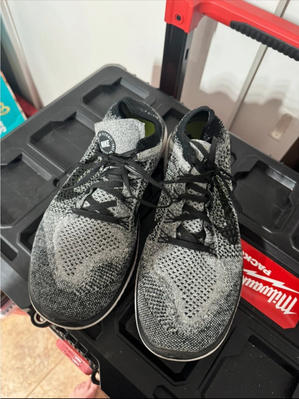 Nike Black and Lime Green Flyknit Trainer